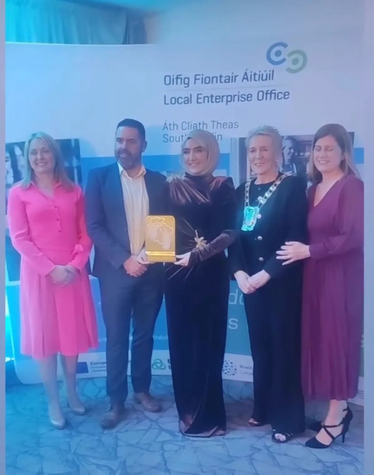 Dr. Elif Torun holding her award with the Local Enterprise Office South Dublin team